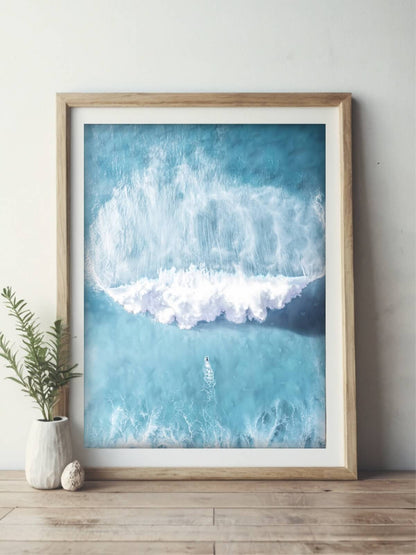 Framed print of aerial surf photography from Bronte Beach on a bedroom wall