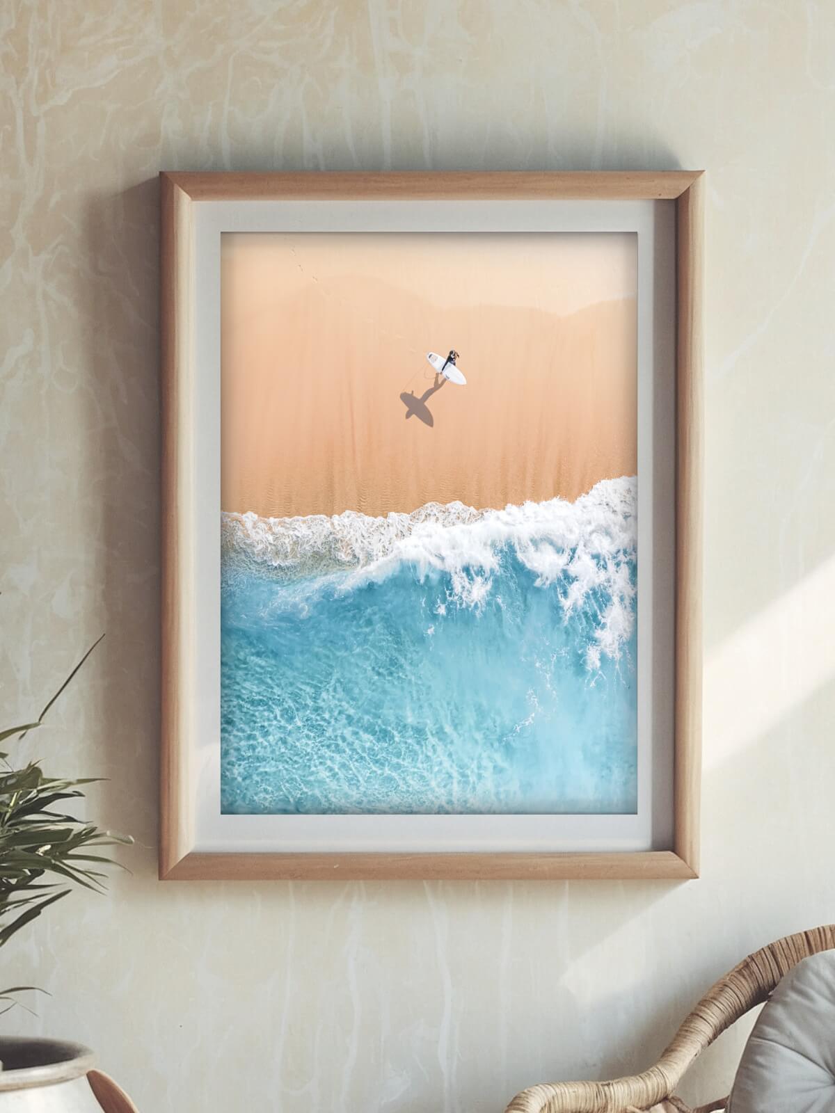 Framed surf photography print of a surfer at Bronte Beach displayed on a wall