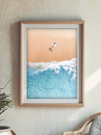 Framed surf photography print of a surfer at Bronte Beach displayed on a wall