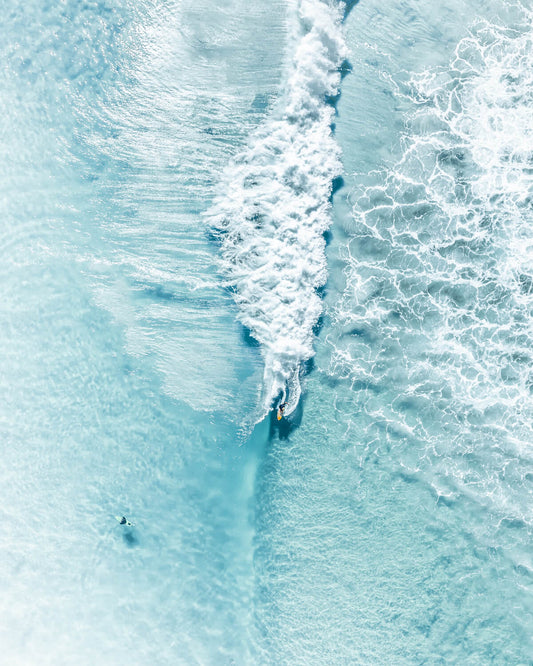 Aerial view of two surfers at The Pass, Byron Bay, NSW Australia