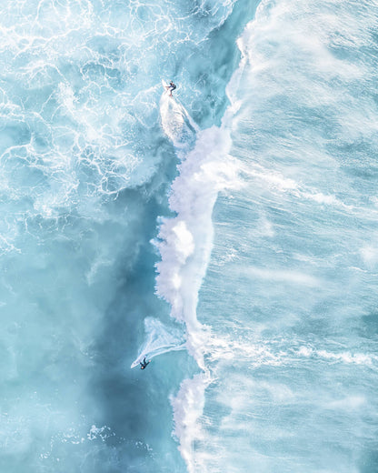 Aerial view of two surfers and white wake patterns at Bronte Beach, Sydney